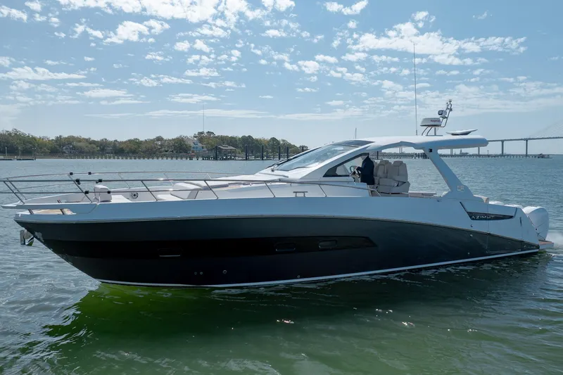 Slide: The Image of 2019 Azimut Verve 40 yacht cruising on a sunny day with scenic background. - 20