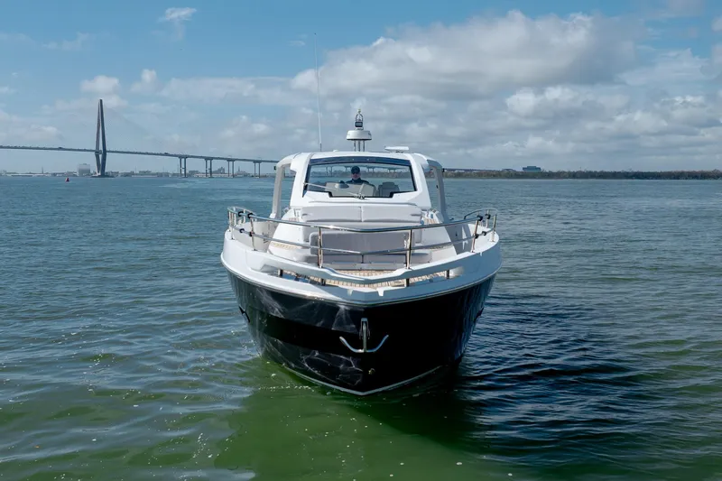Slide: The Image of 2019 Azimut Verve 40 yacht on water with bridge in background. - 21