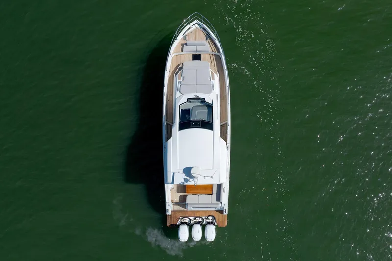 Slide: The Image of Aerial view of 2019 Azimut Verve 40 yacht cruising on green water. - 24