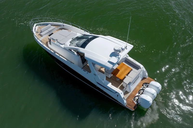 Slide: The Image of 2019 Azimut Verve 40 yacht cruising on open water, aerial view. - 25