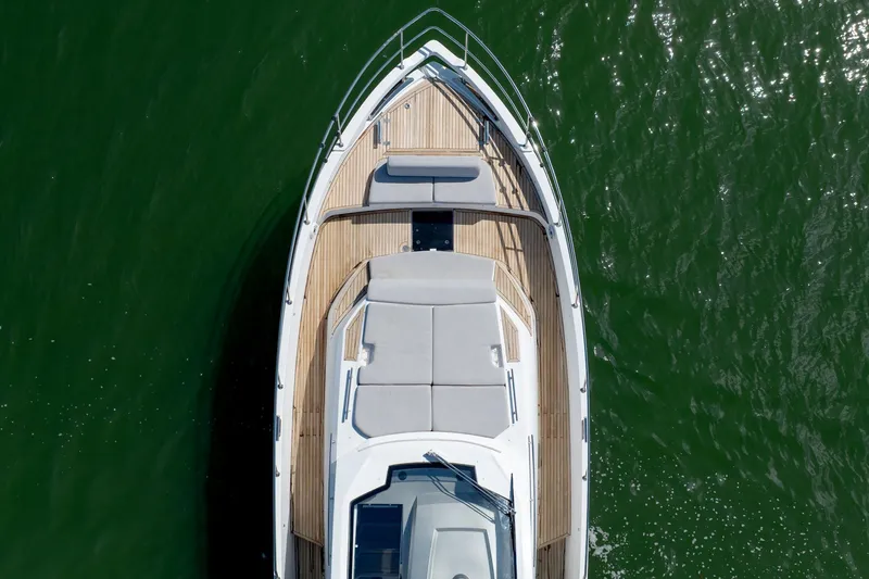 Slide: The Image of Aerial view of 2019 Azimut Verve 40 yacht on green water. - 26