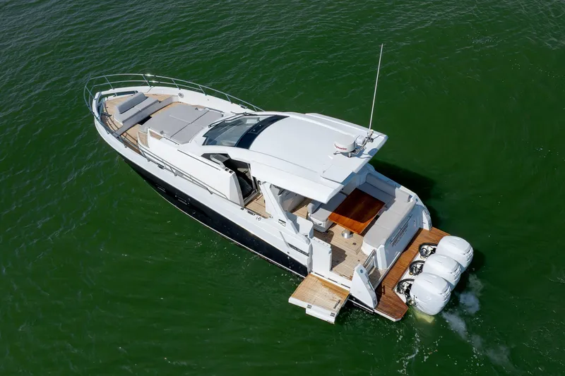 Slide: The Image of 2019 Azimut Verve 40 yacht cruising on green water, aerial view. - 27