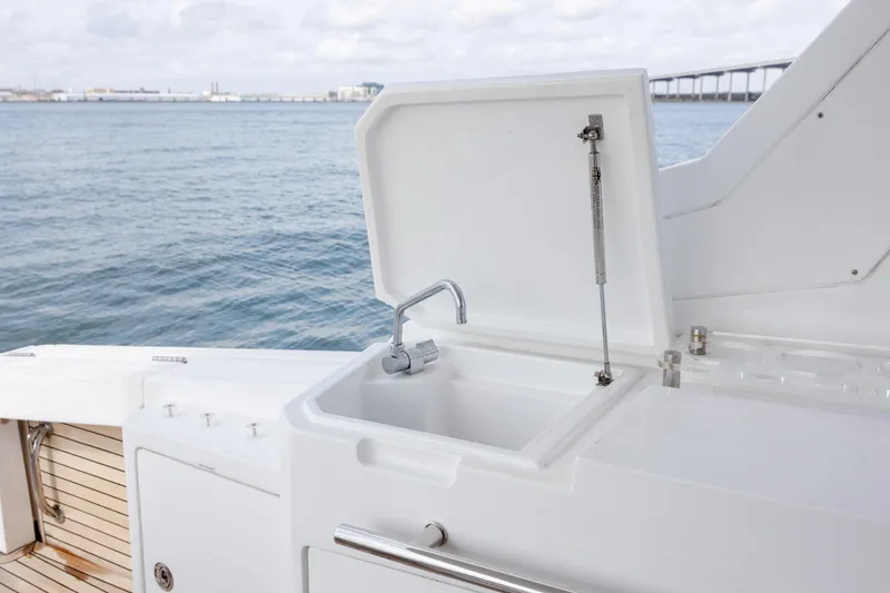 Slide: The Image of 2019 Azimut Verve 40 yacht sink with ocean view in background. - 36