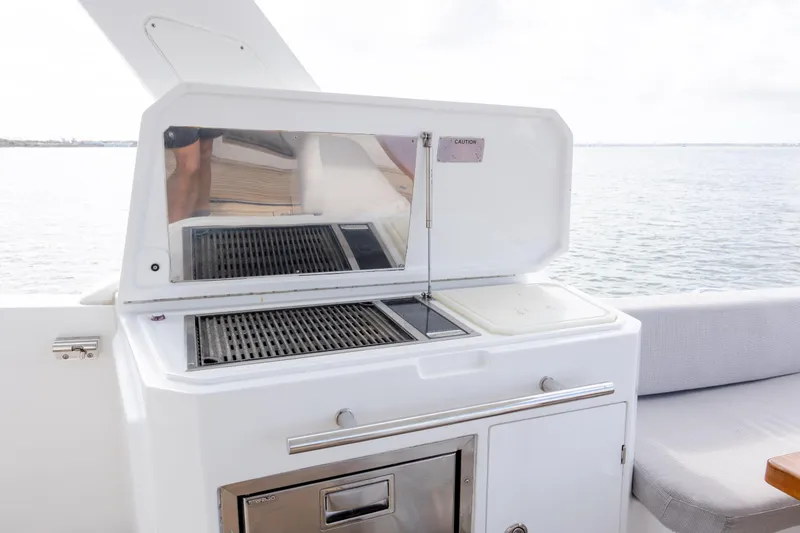 Slide: The Image of Outdoor grill on 2019 Azimut Verve 40 yacht, overlooking serene water. - 39