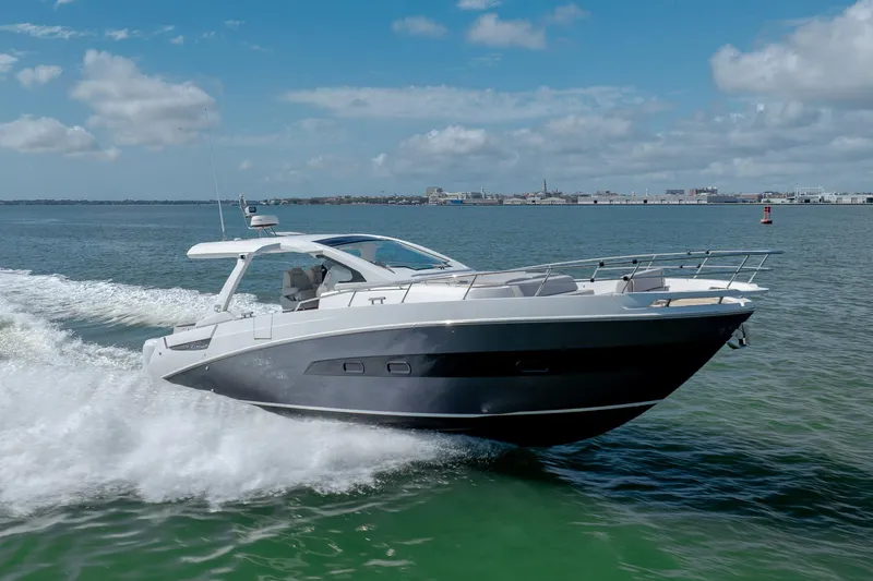 Slide: The Image of 2019 Azimut Verve 40 yacht cruising on open water under a clear sky. - 4