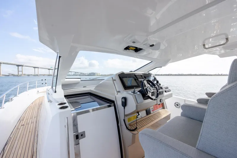 Slide: The Image of 2019 Azimut Verve 40 yacht cockpit with modern navigation system and ocean view. - 43