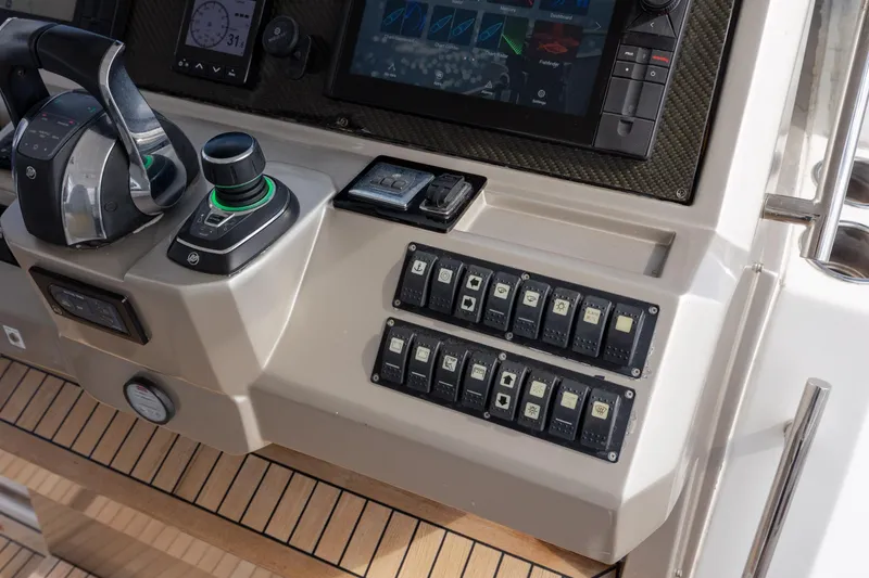 Slide: The Image of Control panel of 2019 Azimut Verve 40 yacht with switches and navigation display. - 47