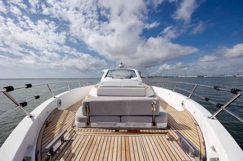 Slide: The Image of 2019 Azimut Verve 40 yacht with sleek deck design under a partly cloudy sky. - 54