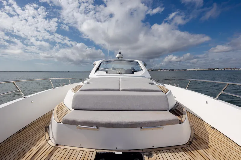 Slide: The Image of 2019 Azimut Verve 40 yacht with spacious deck and luxurious seating, cruising on open water. - 55