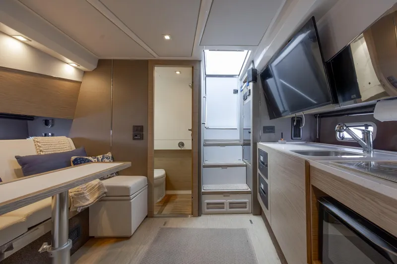 Slide: The Image of Luxurious interior of 2019 Azimut Verve 40 yacht with modern kitchen and seating area. - 64