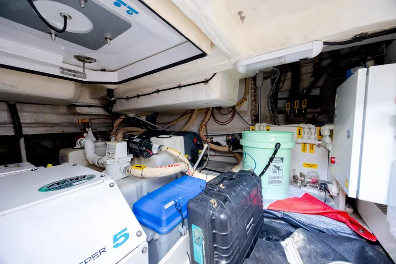 Slide: The Image of Engine room of 2019 Azimut Verve 40 yacht, showcasing equipment and storage. - 83