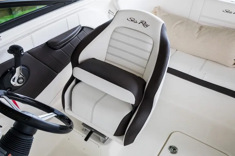 Slide: The Image of Manufacturer Provided Image: 2019 Sea Ray SPX 190 OB captain's chair and steering wheel. - 12