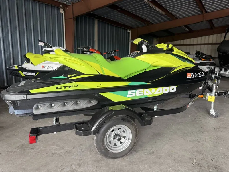 Slide: The Image of 2019 Sea-Doo GTI jet ski on trailer in warehouse. - 4