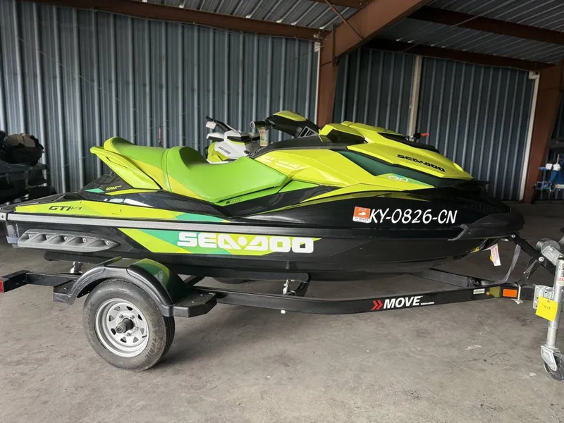 Slide: The Image of 2019 Sea-Doo jet ski on trailer in warehouse. - 8