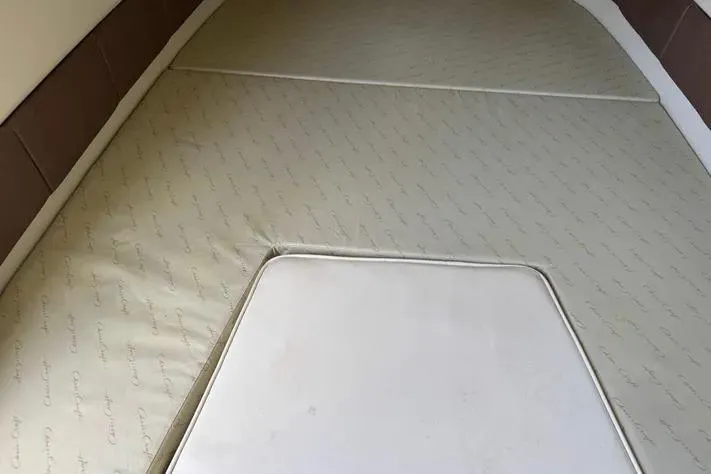 Slide: The Image of 2018 Chris-Craft Catalina 30 cabin interior with custom cushions. - 10