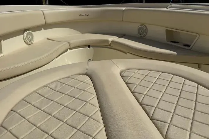 Slide: The Image of Luxurious seating on 2018 Chris-Craft Catalina 30 boat with quilted upholstery. - 13