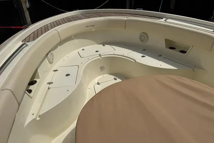 Slide: The Image of 2018 Chris-Craft Catalina 30 boat interior with seating and storage compartments. - 16