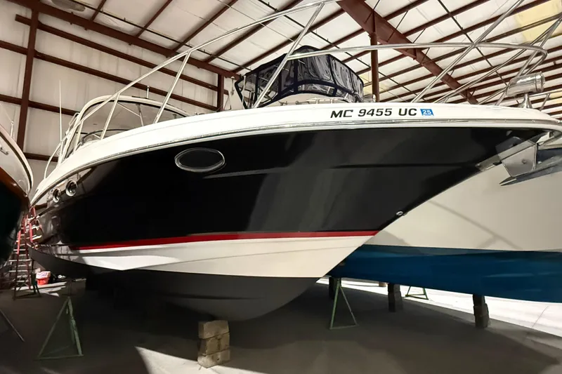 The Image of 2007 Regal Commodore 3760 IO boat in indoor storage, side view. - 0