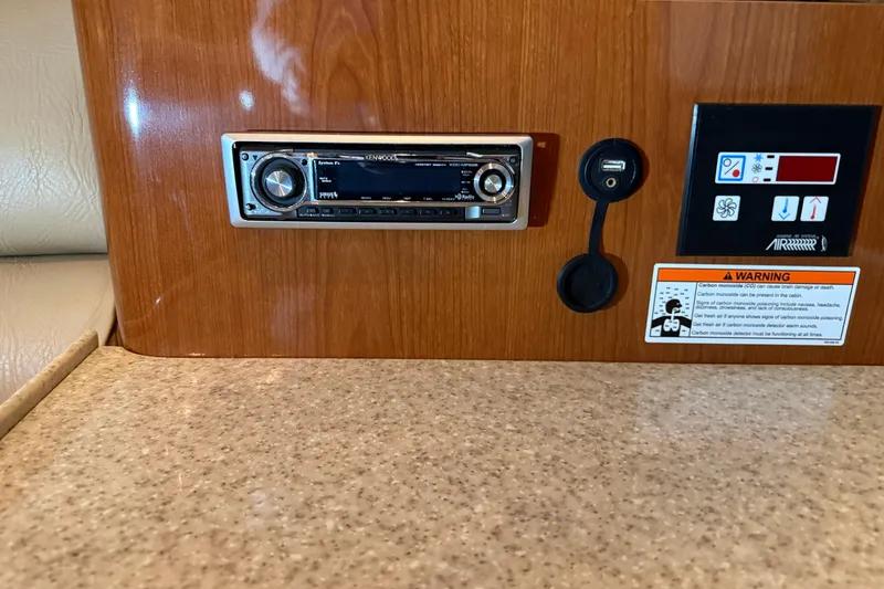 Slide: The Image of 2007 Regal Commodore 3760 IO interior with Kenwood stereo and control panel. - 16