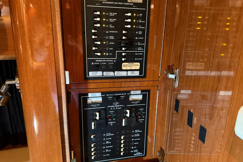 Slide: The Image of Electrical control panel on a 2007 Regal Commodore 3760 IO boat. - 17