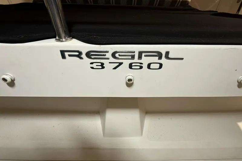 Slide: The Image of 2007 Regal Commodore 3760 IO boat nameplate on white surface. - 29