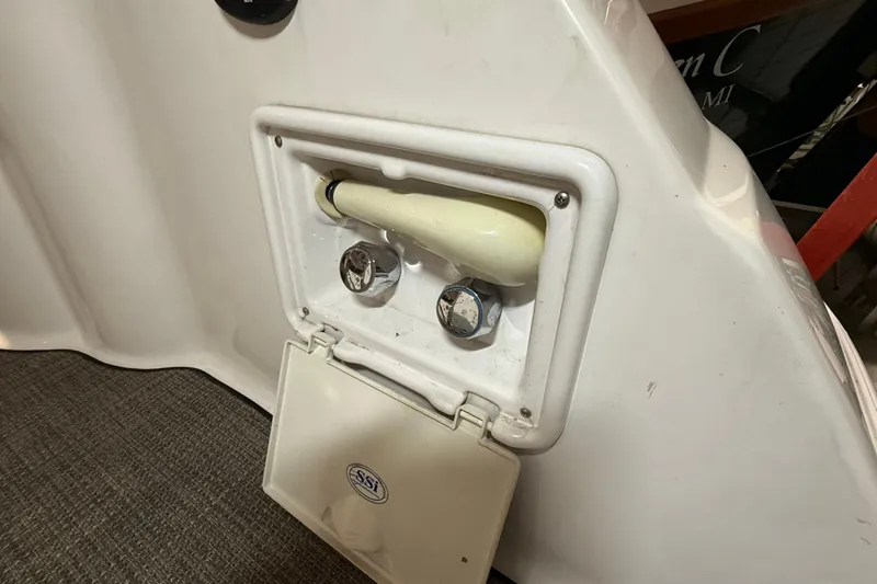 Slide: The Image of 2007 Regal Commodore 3760 IO boat shower compartment with controls and cover. - 30