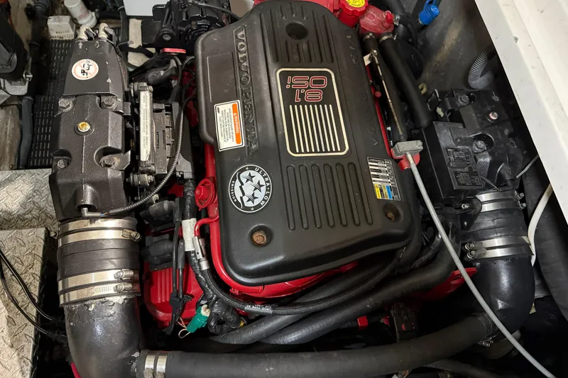 Slide: The Image of Engine compartment of a 2007 Regal Commodore 3760 IO boat, featuring a Volvo Penta 8.1 engine. - 44