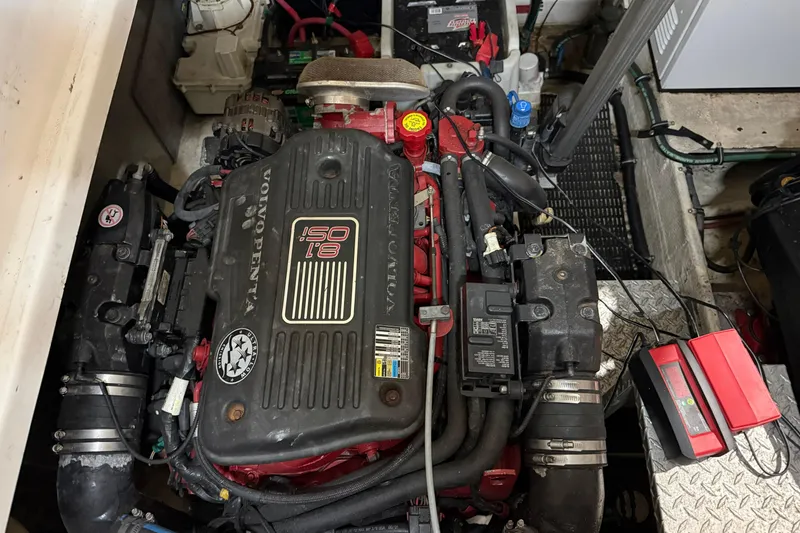 Slide: The Image of Engine compartment of a 2007 Regal Commodore 3760 IO boat, featuring a Volvo Penta engine. - 45