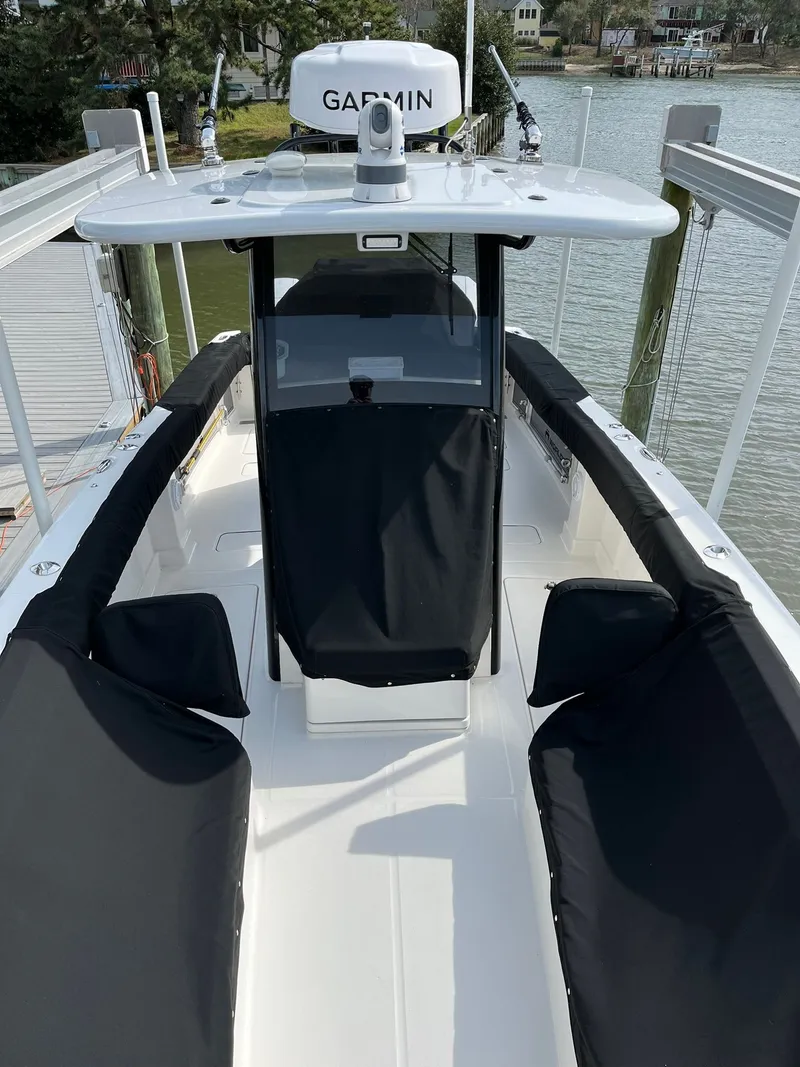 Slide: The Image of 2023 World Cat 280 CC-X boat at dock with Garmin equipment. - 11