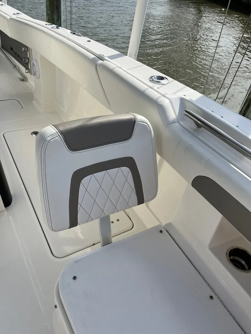 Slide: The Image of Seating area of the 2023 World Cat 280 CC-X boat. - 13