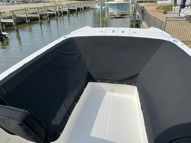 Slide: The Image of Interior view of 2023 World Cat 280 CC-X boat at dock. - 15