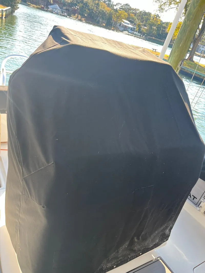 Slide: The Image of Covered boat part on a 2023 World Cat 280 CC-X. - 18