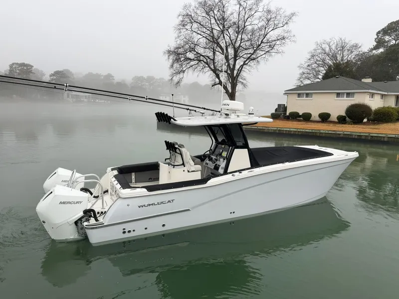 Slide: The Image of 2023 World Cat 280 CC-X boat on foggy water. - 2