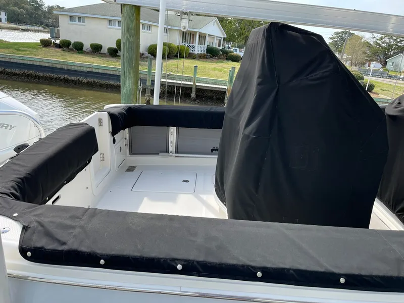 Slide: The Image of Interior of a 2023 World Cat 280 CC-X boat at dock. - 23