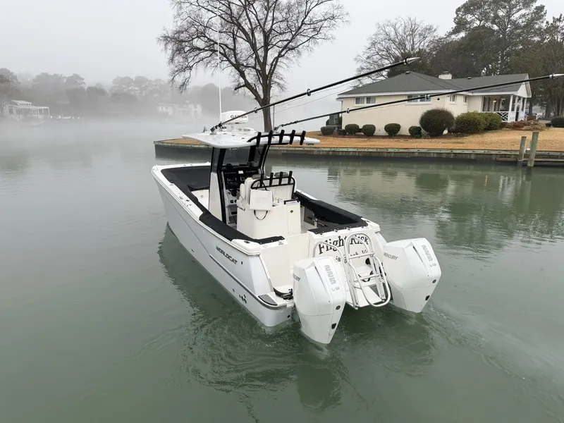 Slide: The Image of 2023 World Cat 280 CC-X boat on misty water. - 3