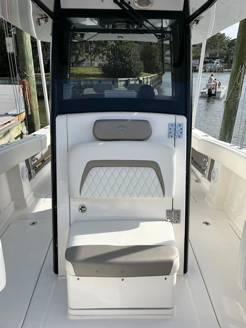Slide: The Image of Interior of 2023 World Cat 280 CC-X boat at dock. - 7