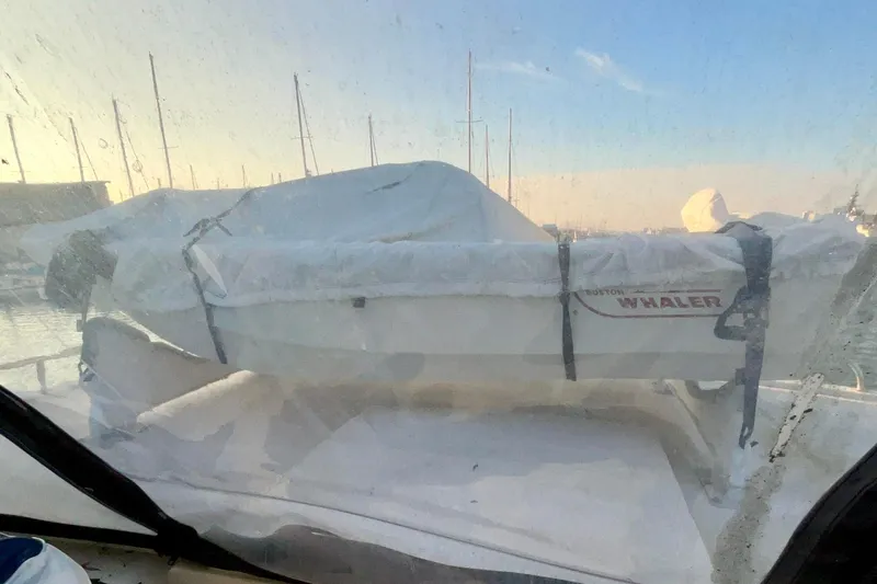 Slide: The Image of 1987 Lien Hwa 47 Cockpit Motor Yacht with covered Boston Whaler on deck. - 26