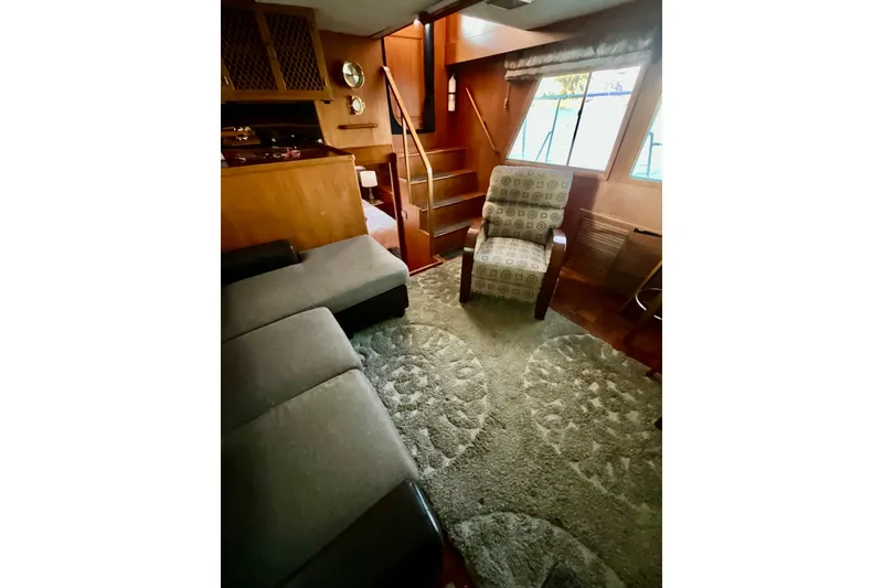 Slide: The Image of Interior of 1987 Lien Hwa 47 Cockpit Motor Yacht with cozy seating and carpet. - 4