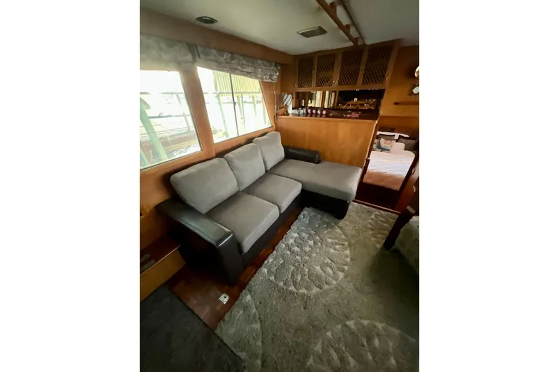 Slide: The Image of Interior of 1987 Lien Hwa 47 Cockpit Motor Yacht with cozy seating area. - 5