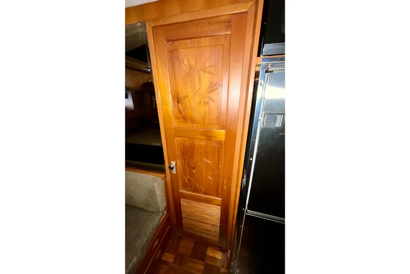 Slide: The Image of Wooden door with bamboo design inside 1987 Lien Hwa 47 Cockpit Motor Yacht. - 9