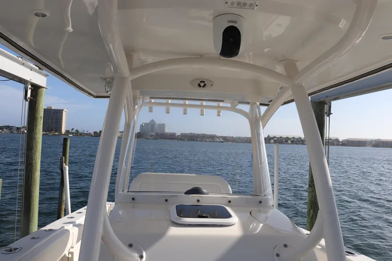 Slide: The Image of 2013 Jupiter 30 boat interior with ocean view and city skyline in background. - 6
