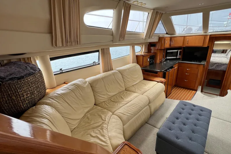 Slide: The Image of Luxurious interior of 2003 Carver 444 Cockpit Motor Yacht with leather seating and modern kitchen. - 42