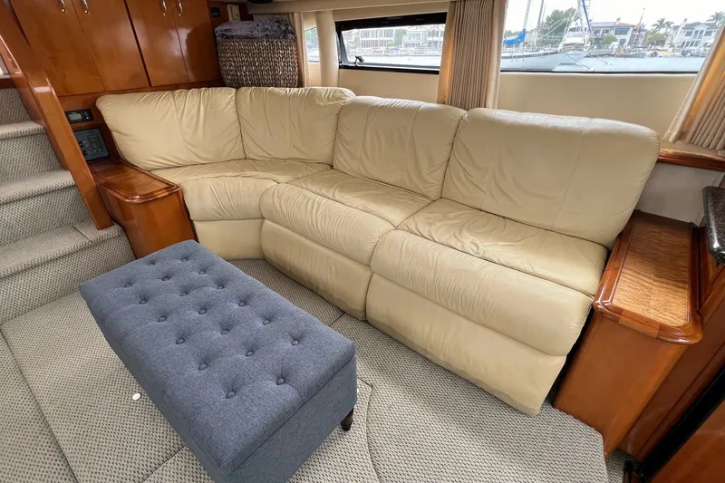 Slide: The Image of Luxurious interior of 2003 Carver 444 Cockpit Motor Yacht with beige leather sofa. - 46