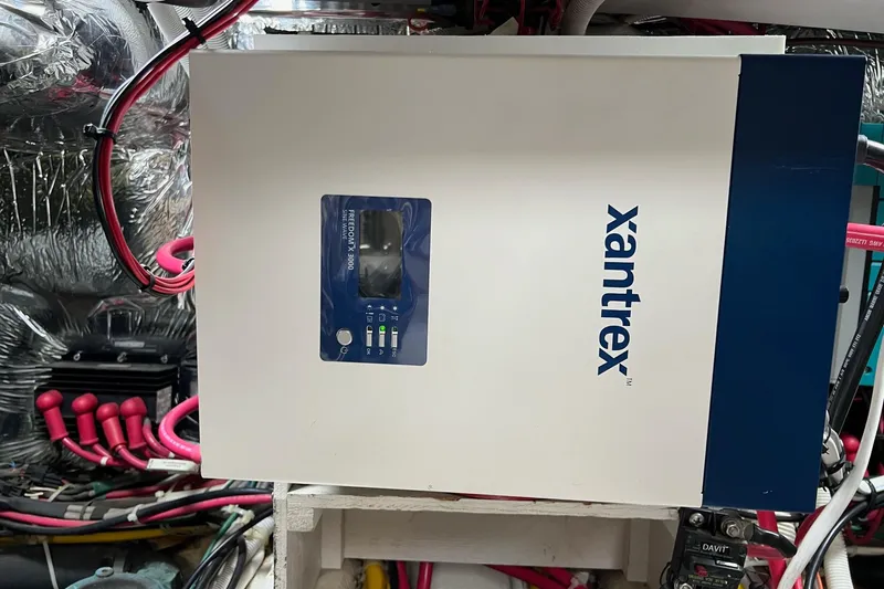 Slide: The Image of Xantrex inverter in 2003 Carver 444 Cockpit Motor Yacht engine room, surrounded by wiring. - 71