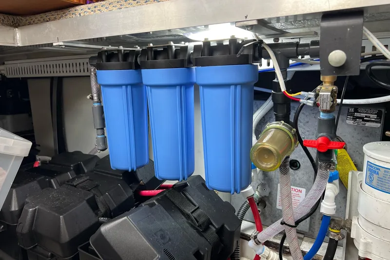 Slide: The Image of Water filtration system in a 2003 Carver 444 Cockpit Motor Yacht engine room. - 73