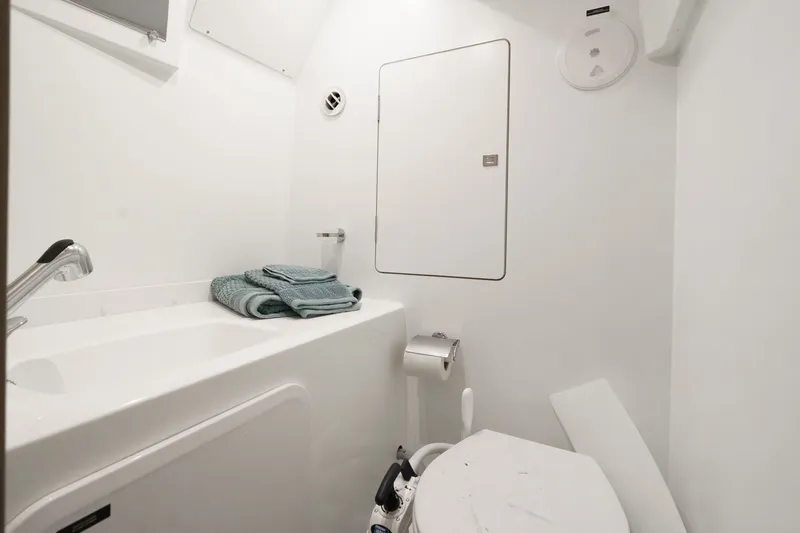 Slide: The Image of Interior view of a 2018 Prestige 560 yacht bathroom. - 12