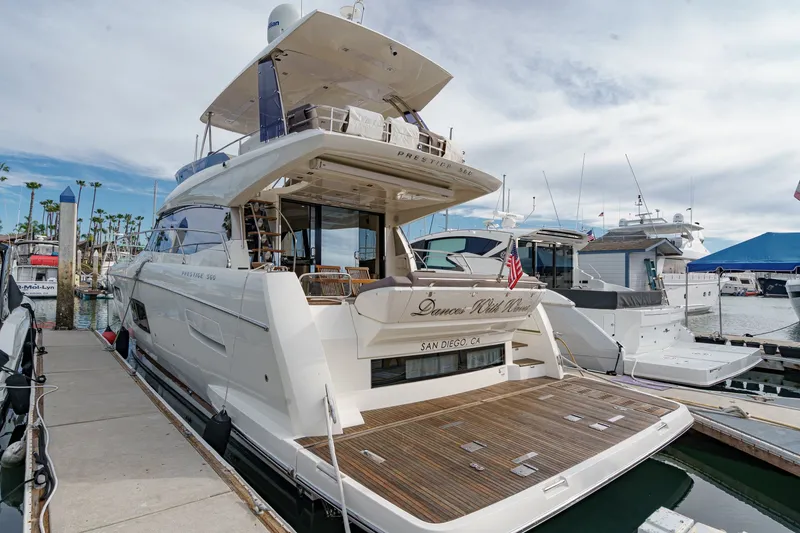 Slide: The Image of Luxury yacht Prestige 560 from 2018 docked in San Diego harbor. - 2