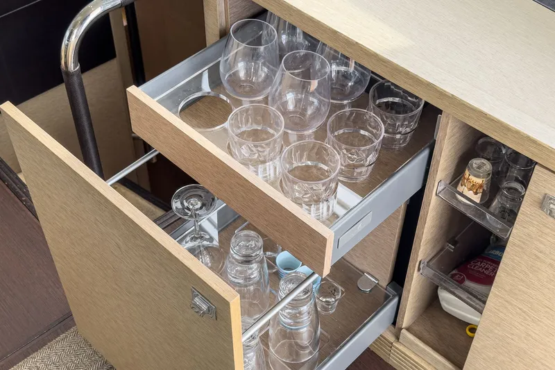 Slide: The Image of Glasses in drawers on a 2018 Prestige 560 yacht. - 21