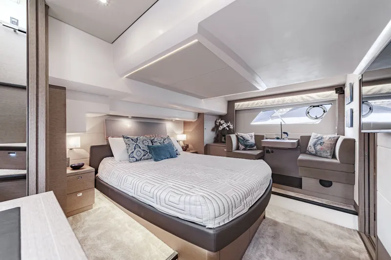 Slide: The Image of Luxurious bedroom on a 2018 Prestige 560 yacht. - 26
