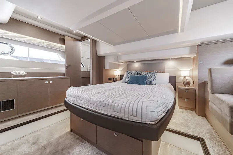 Slide: The Image of Luxurious bedroom on a 2018 Prestige 560 yacht. - 28